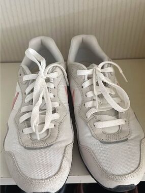 Nike White Sneakers with Pink Swoosh Accent